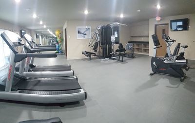 Fitness center with stair stepper and treadmill